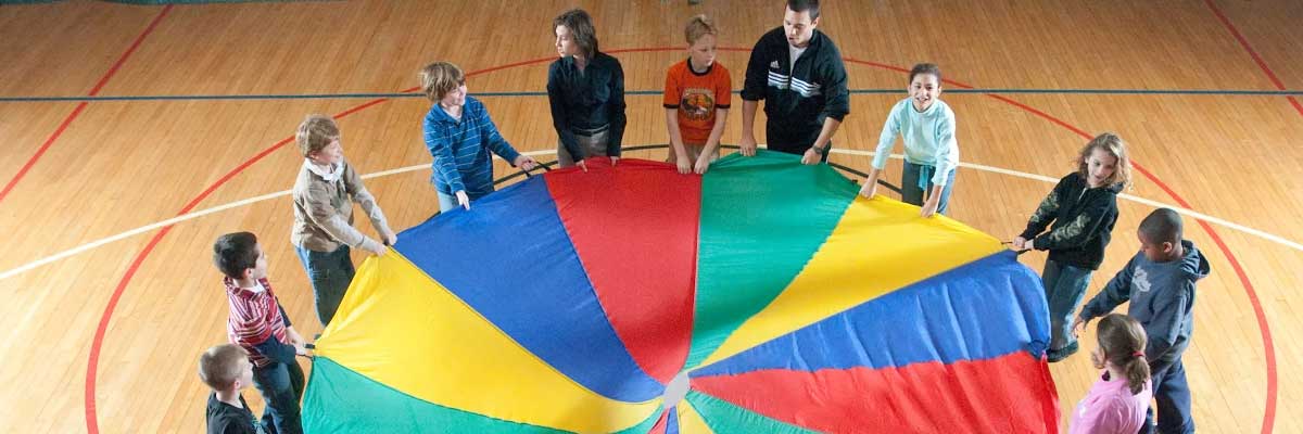 kids playing with parachute